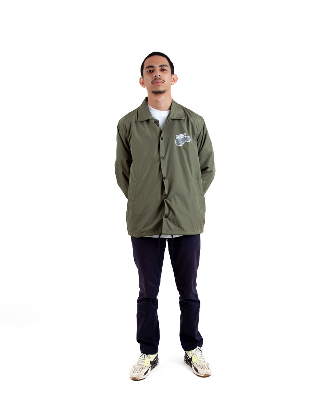 Essential Green Coach Jacket: A Trendy Addition to Your Wardrobe